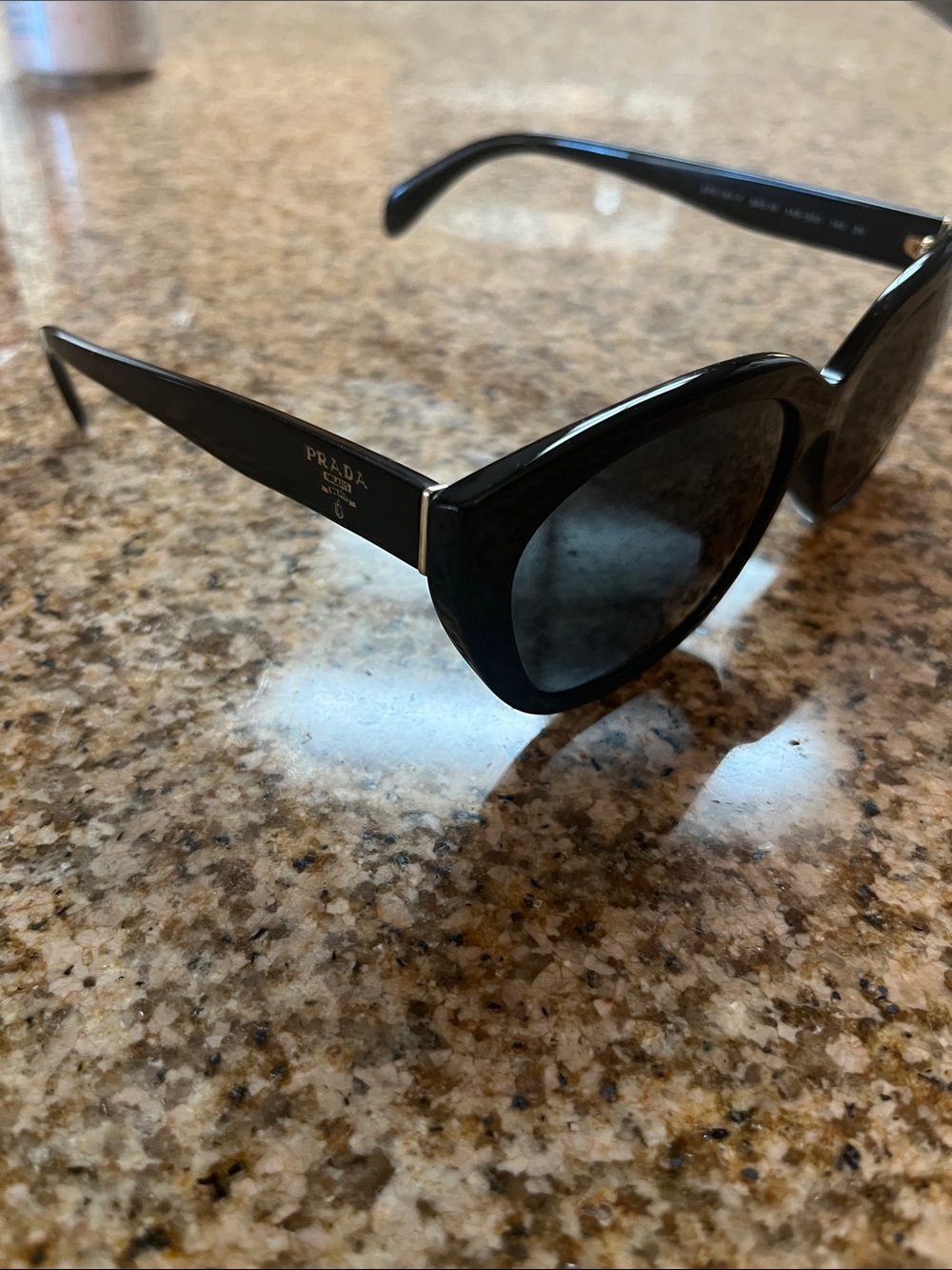 Prada Black Cat-Eye Sunglasses with Dark Lenses